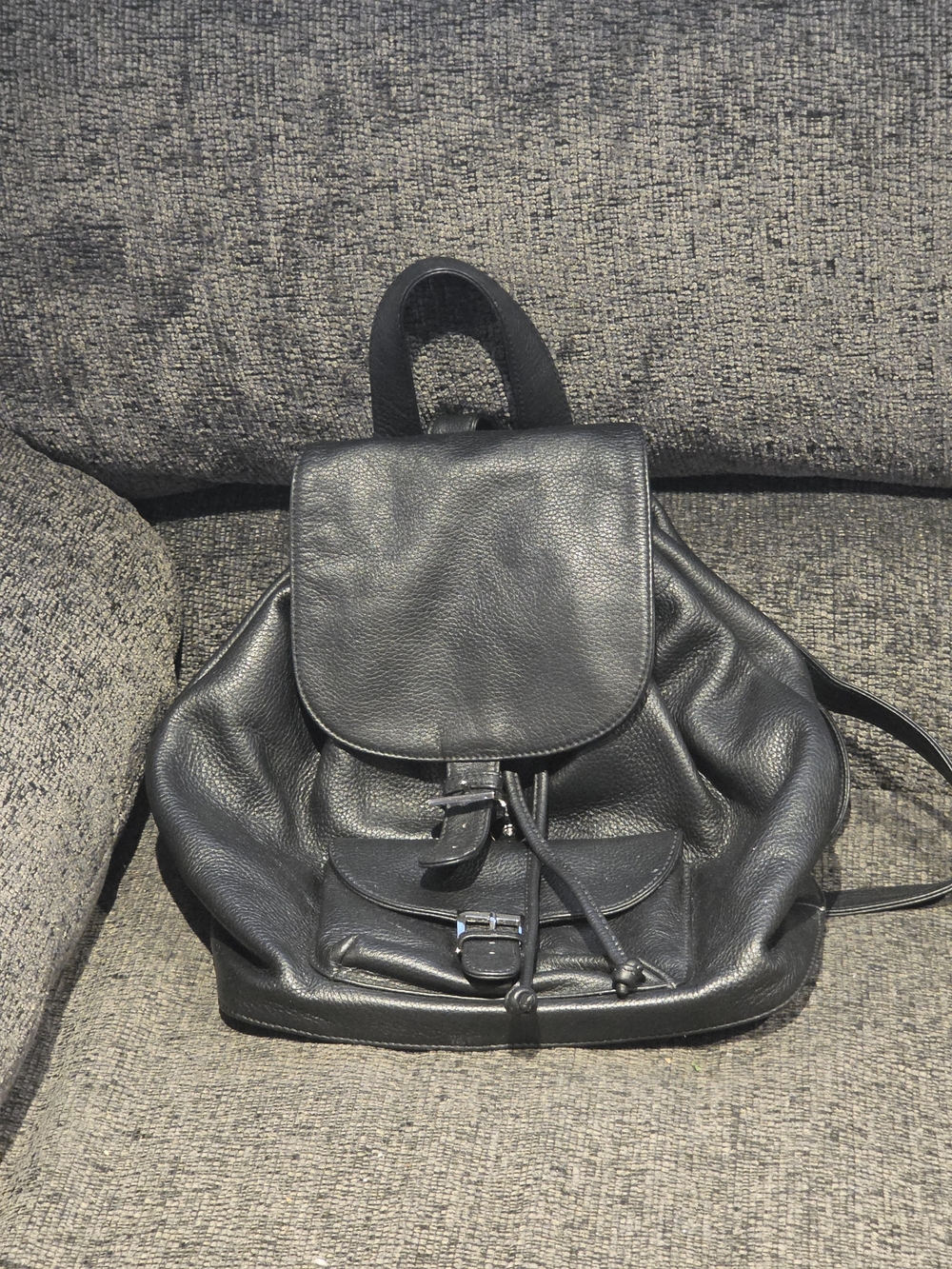 Danier Black Leather Backpack with Front Buckle Pocket